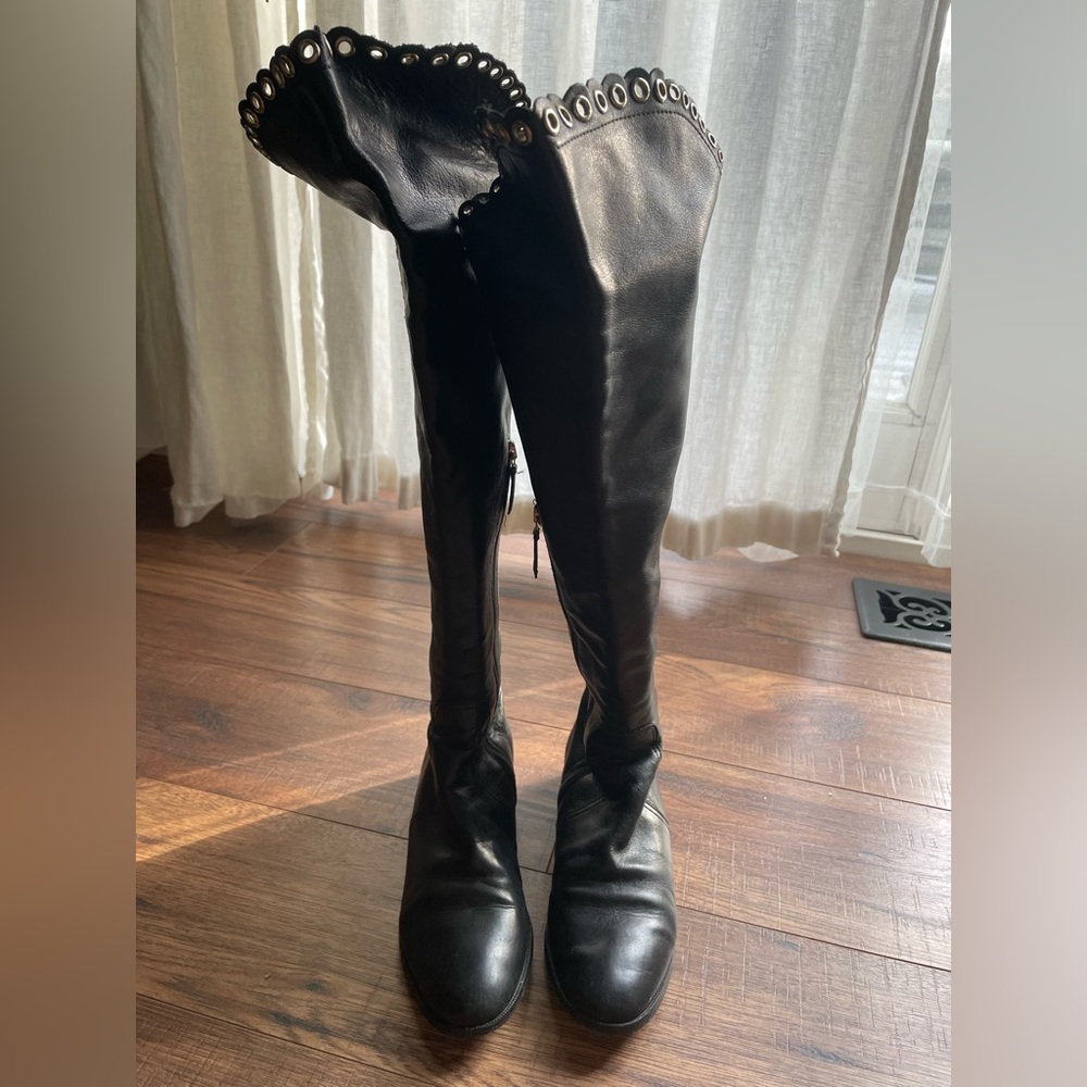 over the knee leather boots with beautiful design. authentic.